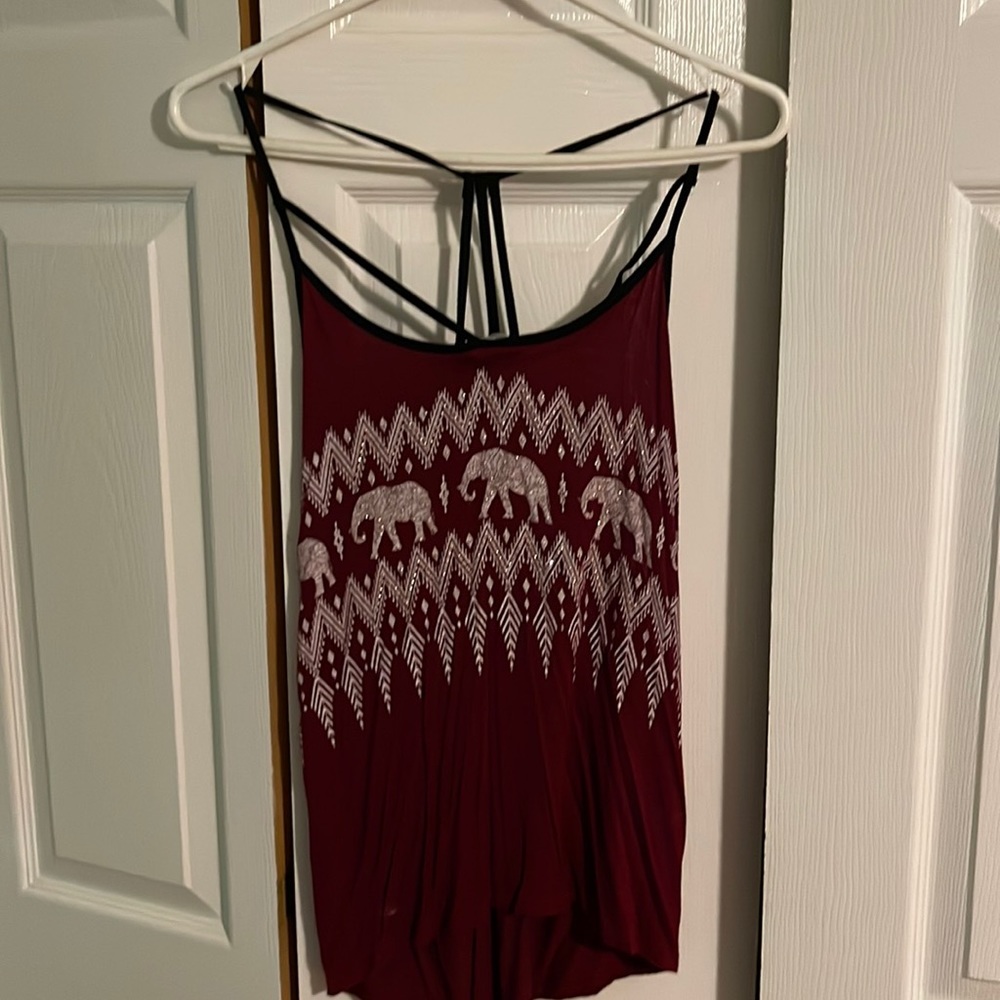 Elephant top with an open back